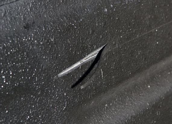 Small repair example 1 — bedliner gouge before repair